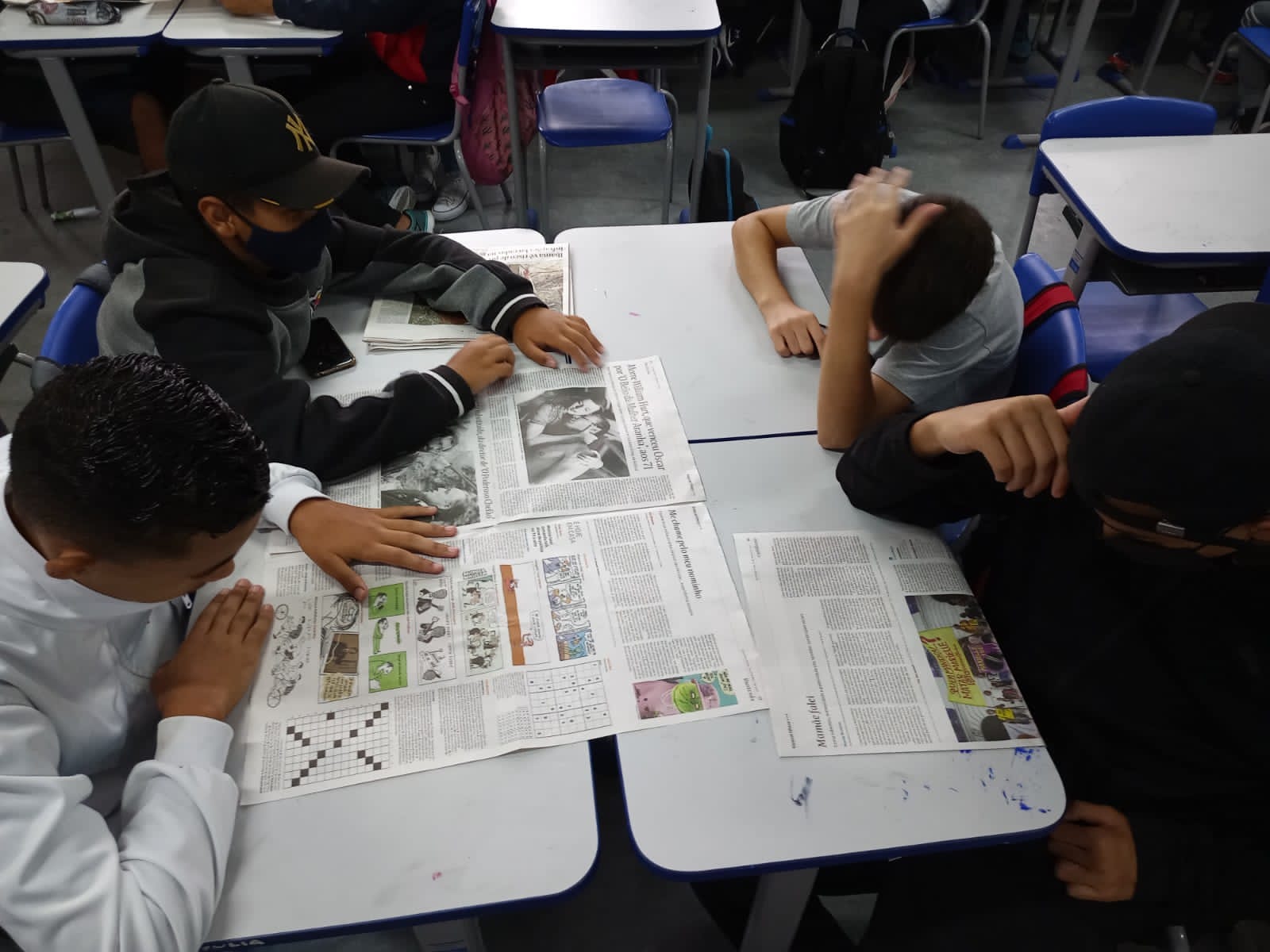 A generic square placeholder image with rounded corners in a figure.