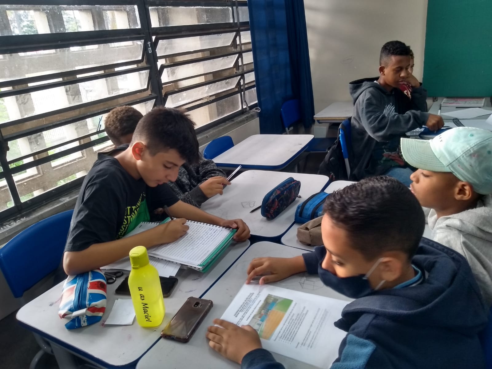 A generic square placeholder image with rounded corners in a figure.