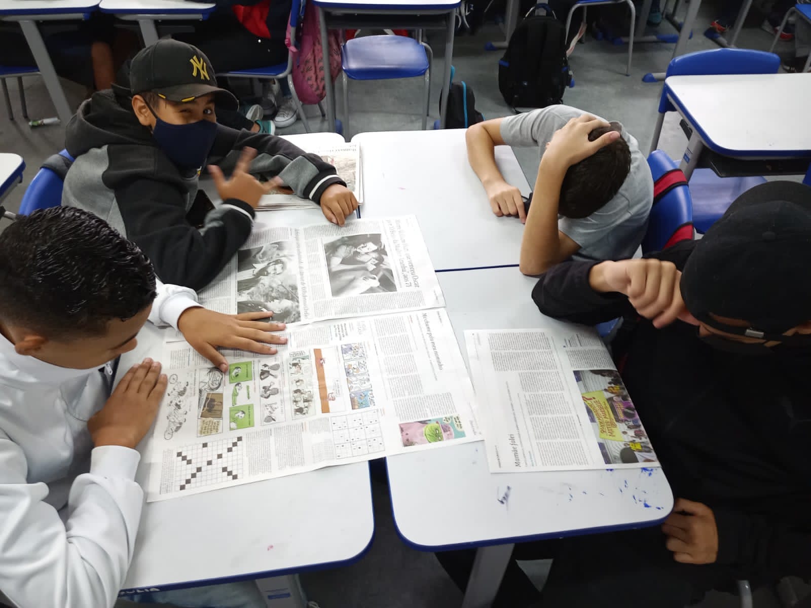 A generic square placeholder image with rounded corners in a figure.