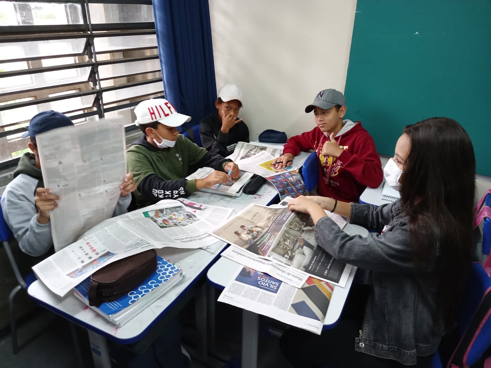 A generic square placeholder image with rounded corners in a figure.