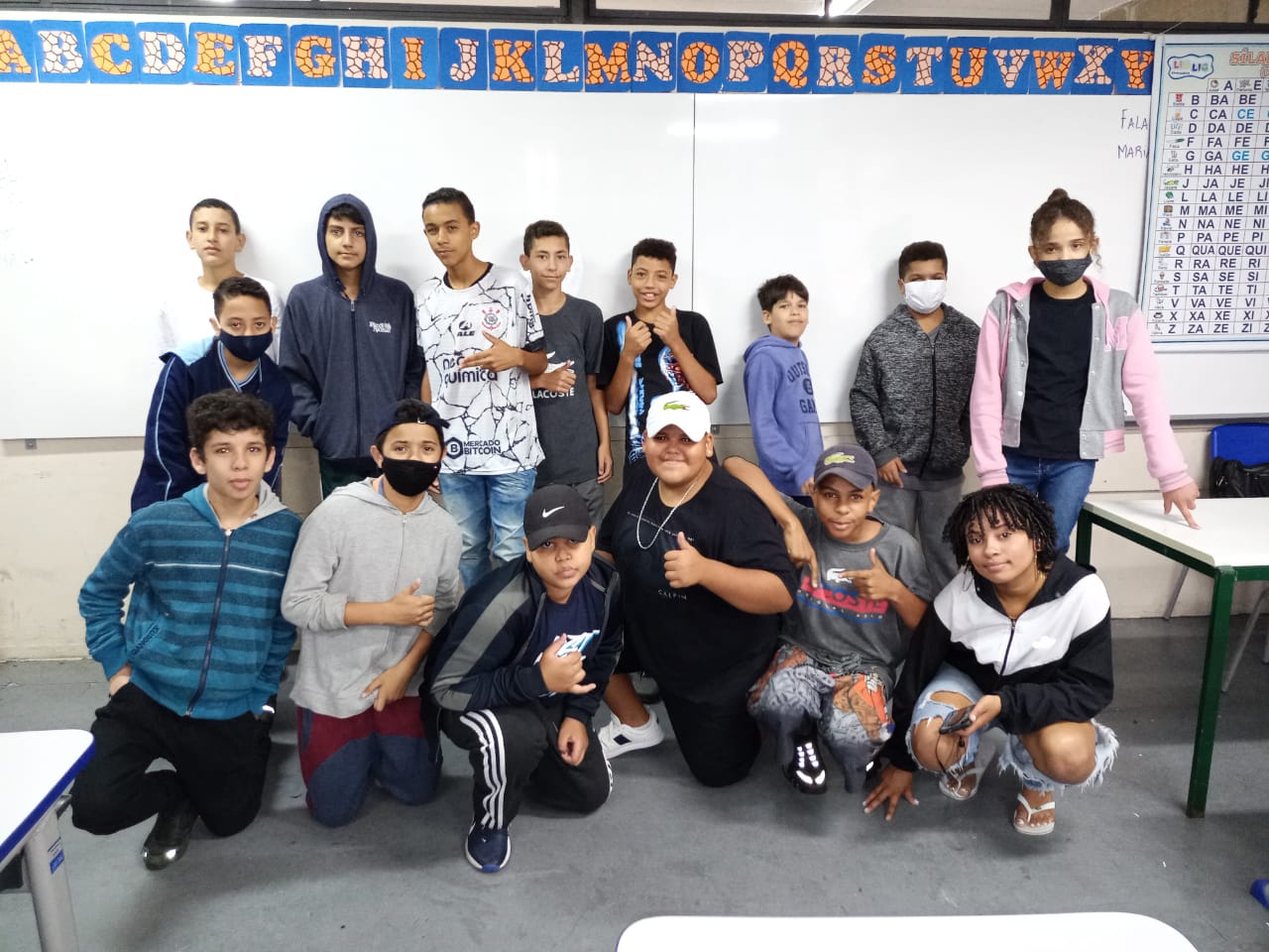 A generic square placeholder image with rounded corners in a figure.