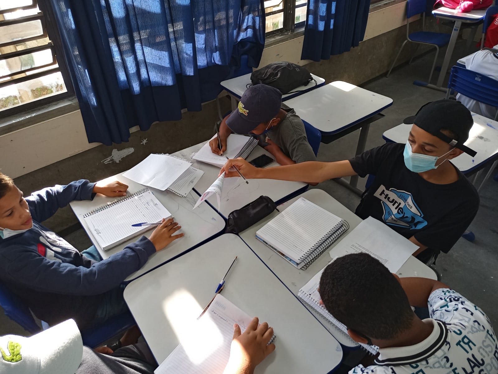 A generic square placeholder image with rounded corners in a figure.