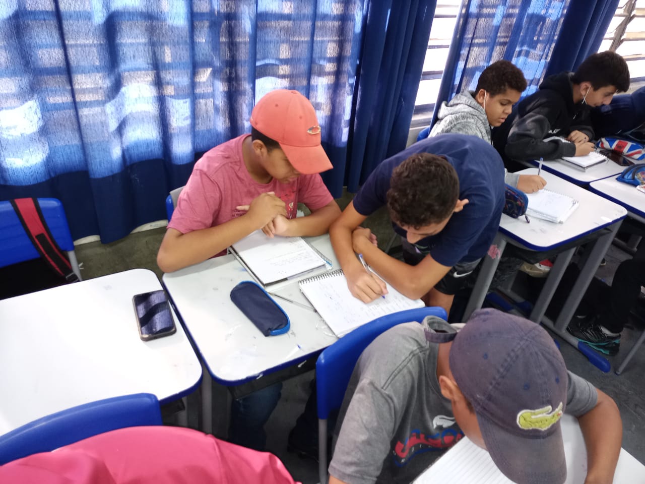 A generic square placeholder image with rounded corners in a figure.