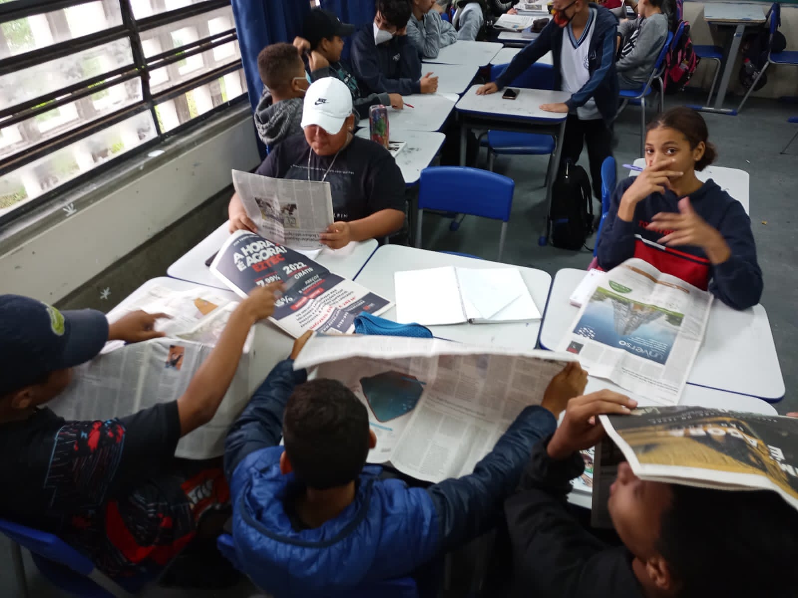 A generic square placeholder image with rounded corners in a figure.